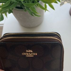 coach wallet in signature brown logo